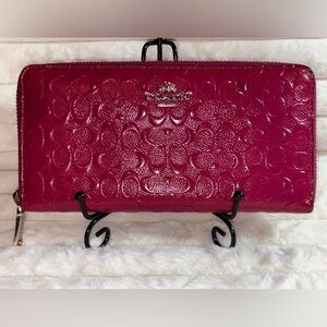 Coach Fuchsia Embossed Floral Wallet